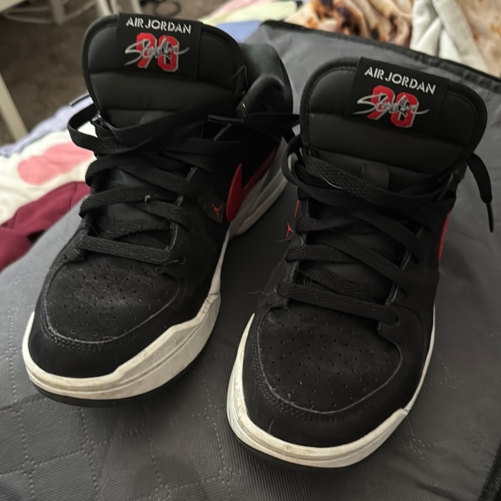 Air Jordan Sneakers with Red Swoosh